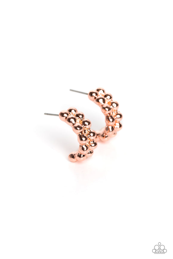 Two rows of shiny copper stack and form into a scalloped pattern. Daintily curling around the ear, the bubbly effect of the high-sheen metal creates a radiant, monochromatic hoop. Earring attaches to a standard post fitting. Hoop measures approximately 1/2