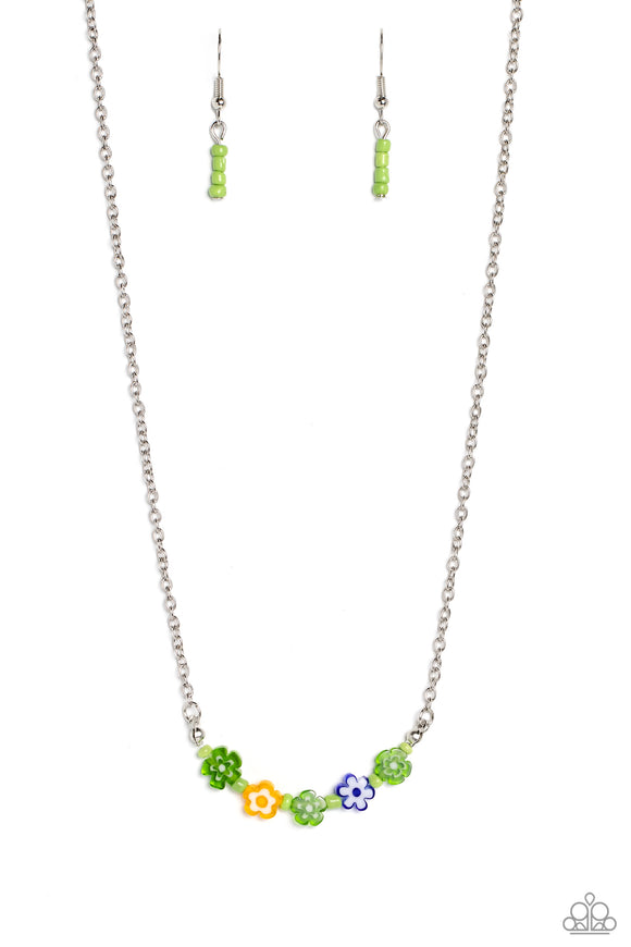 Infused at the bottom of a dainty silver chain, a row of flower beads in shades of green, yellow, and blue rest below the neckline. Separating each floral bead, green seed beads create additional pops of color against the seasonal flowers. Features an adjustable clasp closure.  Sold as one individual necklace. Includes one pair of matching earrings.