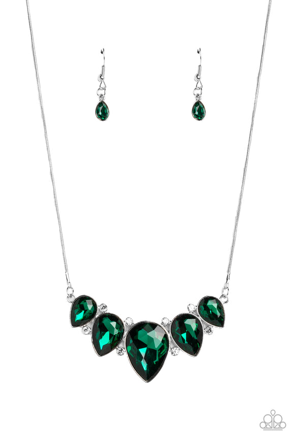 Featuring a dramatic emerald shade, a collection of teardrop gems hanging from a sleek, silver snake chain, are pressed into high-sheen silver casings, creating a colorful fringe below the collar. Linking each teardrop together, dainty white rhinestones border the tops and bottoms of each shape, creating additional eye-catching dazzle. Features an adjustable clasp closure.  Sold as one individual necklace. Includes one pair of matching earrings.