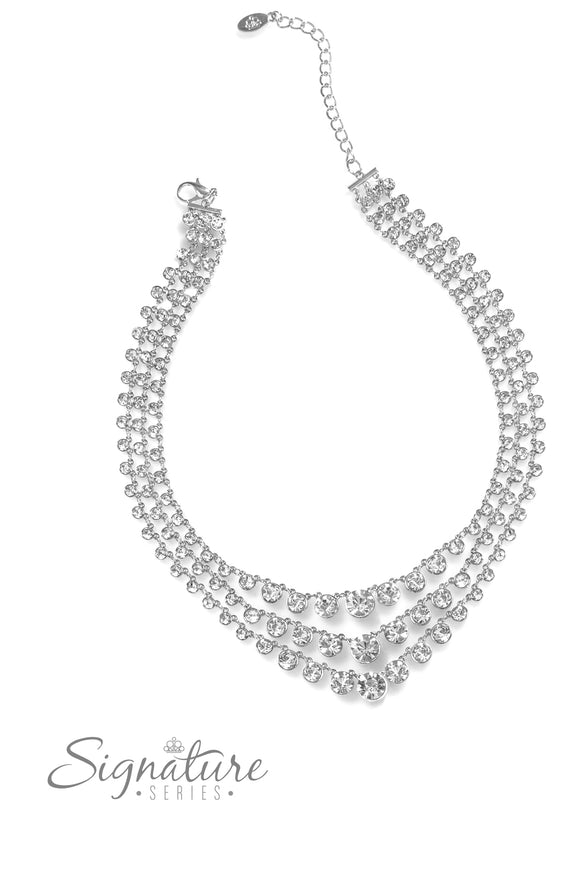 Rows of glittery, white rhinestones drape between two sleek silver bars, falling into three luxurious layers. The sparkling gems gradually increase in size as they fall toward the center of the design, adding dazzling dimension to the twinkling tiers. Features an adjustable clasp closure.  Sold as one individual necklace. Includes one pair of matching earrings.