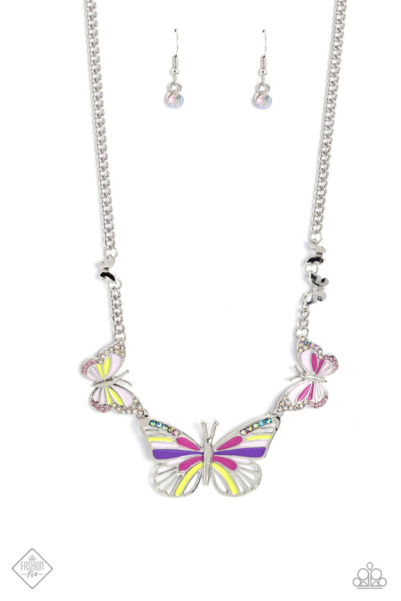 Featuring Fuchsia Fedora, Love Bird, purple, and baby pink details, a trio of butterflies links along the neckline for a whimsical pop of color. Each elaborate butterfly is sprinkled with dainty multicolored and iridescent rhinestones, adding a dazzling touch of sparkle. Finishing off the design, additional dainty silver butterflies climb along each side of the classic silver chain for a fanciful finish. Features an adjustable clasp closure. Due to its prismatic palette, color may vary. 