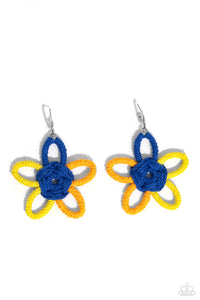 Featuring High Visibility, Persian Jewel, and orange yarn, an oversized flower swings freely from a dainty silver hoop, creating a playful lure. Earring attaches to a standard post fitting. Hoop measures approximately 1/2" in diameter.  Sold as one pair of hoop earrings.