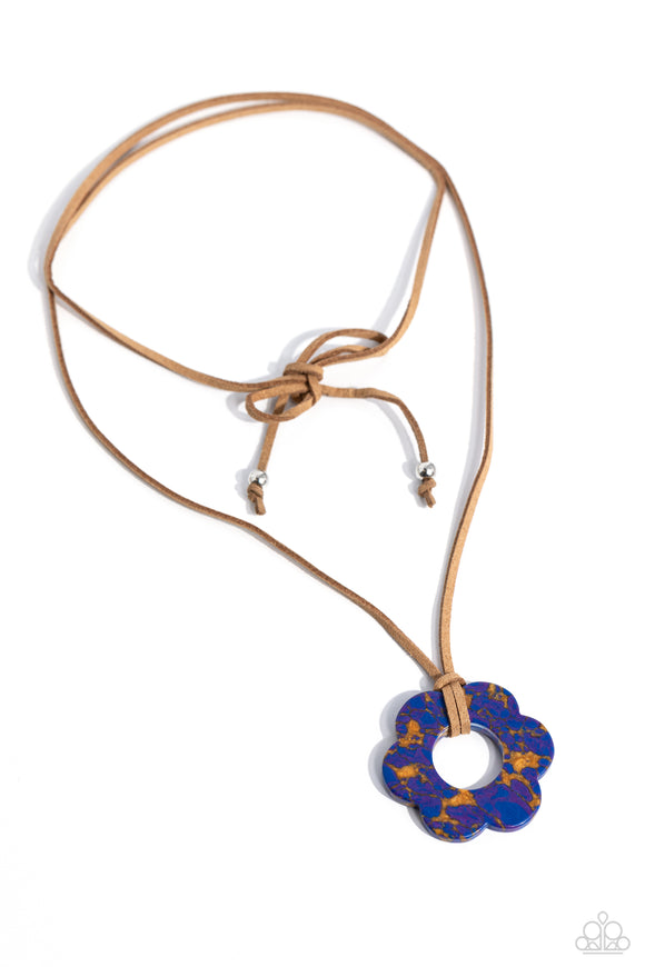 Featuring purple and brown marbling, an airy blue flower is knotted at the bottom of a lengthened strand of brown suede for a southwestern-inspired statement. Features an adjustable tie closure.  Sold as one individual necklace. Includes one pair of matching earrings.