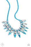 Bordering an emerald-cut white gem, round white gems are pronged in place along electric blue frames that gradually add on metallic blue spikes as they coalesce towards the center of the neckline for an intense, electric fringe. Features an adjustable clasp closure.  Sold as one individual necklace. Includes one pair of matching earrings.