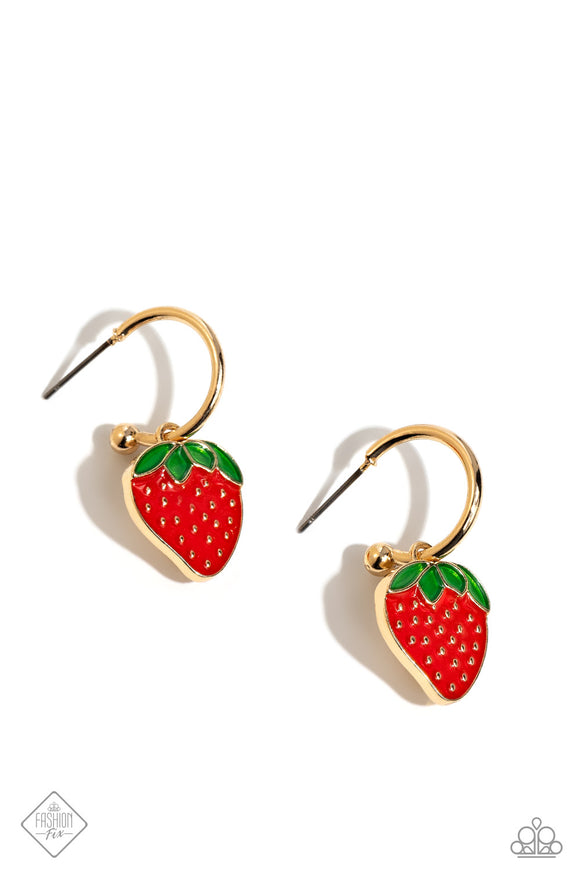 A small, skinny, gold hoop curves around the ear in a timeless fashion. A gold ball is affixed to the end of the hoop, reminiscent of a barbell fitting. A red strawberry charm slides along the curvature of the hoop, adding a surprising hint of shimmery movement. Earring attaches to a standard post fitting. Hoop measures approximately 1/2