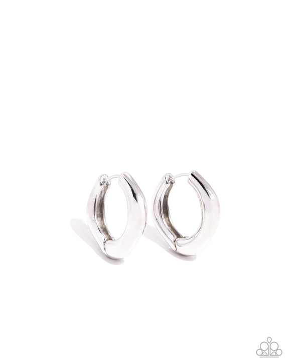 Featuring an oblong-cut, an abstract silver hoop hugs the ear for a sleek, monochromatic design. Earring attaches to a standard hinge closure fitting. Hoop measures approximately 1