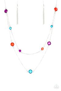 Varying in size, glassy multicolored gems trickle along dainty silver chains, creating sparkling layers across the chest. Features an adjustable clasp closure.  Sold as one individual necklace. Includes one pair of matching earrings.