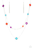 Varying in size, glassy multicolored gems trickle along dainty silver chains, creating sparkling layers across the chest. Features an adjustable clasp closure.  Sold as one individual necklace. Includes one pair of matching earrings.