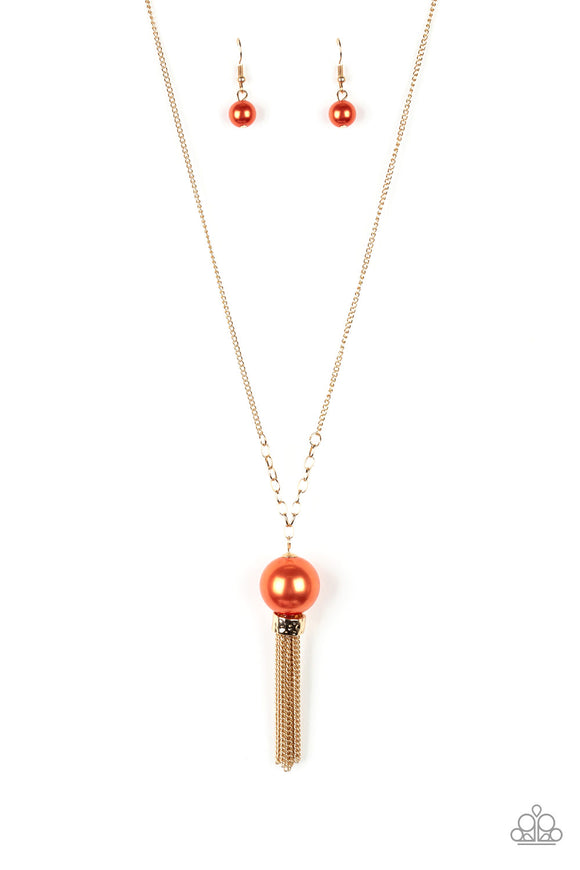 A dramatic pearly orange bead swings from the bottom of an elegantly elongated gold chain. Featuring a hammered fitting, a gold tassel streams from the bottom of the colorful pendant for a refined finish. Features an adjustable clasp closure.  Sold as one individual necklace. Includes one pair of matching earrings.